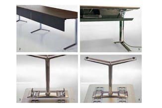 Vier verschillende vergadertafels: twee met zwarte/groene frames en houten bladen, twee met centrale stalen zuilen en houten