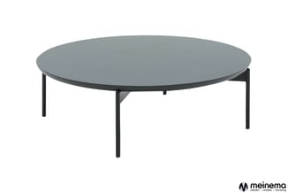 Ronde lage tafel met grijs blad en zwart metalen poten, modern design.