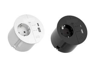 Twee ronde wandstopcontacten in wit en zwart met geïntegreerde USB-poorten en aardingsgat, frontaanzicht.