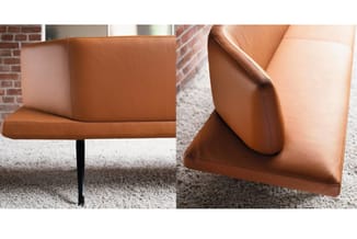 Cognac bruine leren loungefauteuil met zwart metalen poot, voor- en zijaanzicht op grijze vloer.