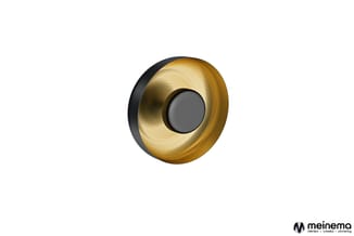 Gouden wandplaat met donkergrijs centrale knop, brushed metallook afwerking, ronde vorm.