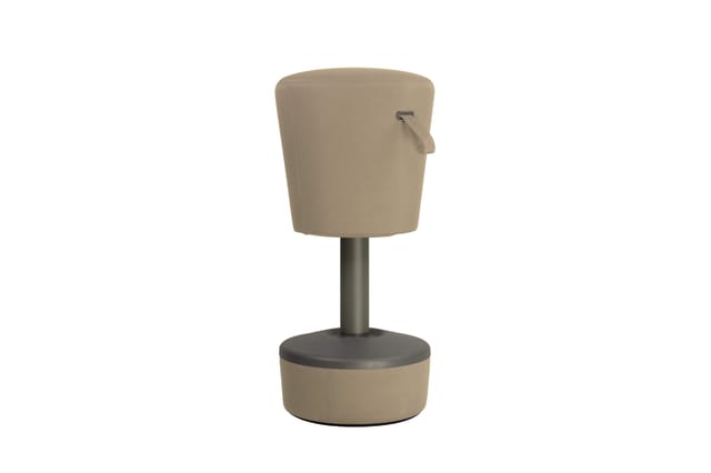 Beige fauteuil met metalen poot en donkergrijs zitgedeelte, zijaanzicht tegen witte achtergrond.